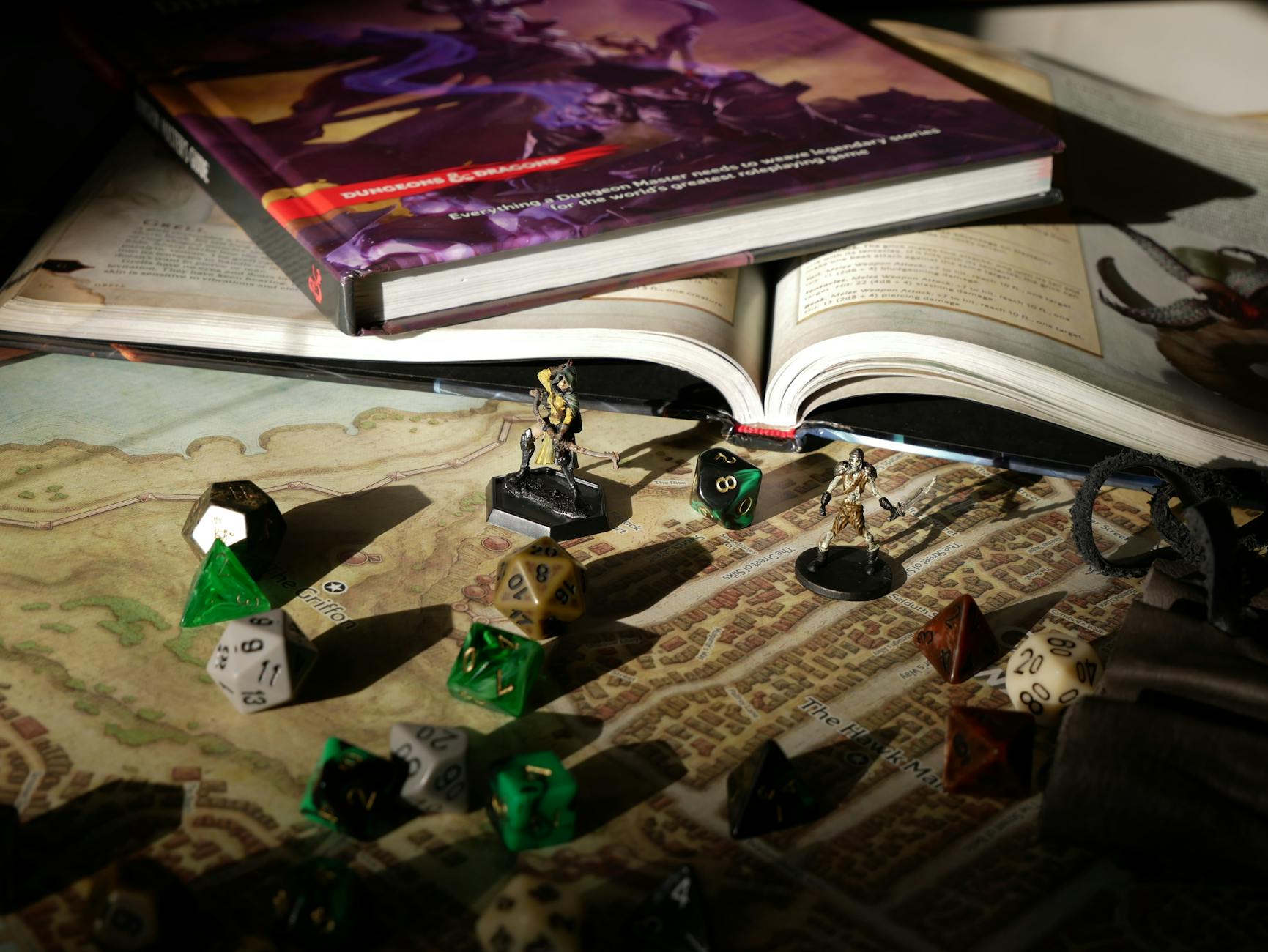 figurines and dice on board game map